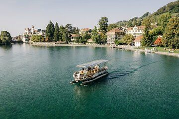Silently across Lake Thun Private tour with solar ship