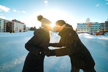 Ice skating private couple photography session Rovaniemi