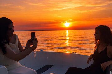 Sunset Tour Swim Island Dinner Stop and Golden Hour Cruise