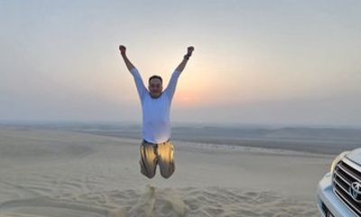 Doha airport layover transfer private desert safari camel ride