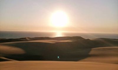 Sandwich Harbor Sunset with Dune Drive and Ocean Views