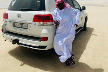 Qatar Desert Adventure Dune Bashing Camel Ride and Falcon photo
