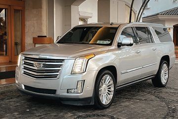 From Puerto Morelos: Private Deluxe Transport to Cancun Airport