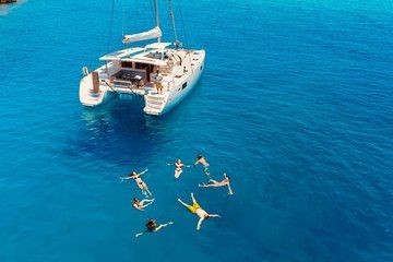 All Inclusive Catamaran Cruise to Anthony Quinn, Ladiko & Caves