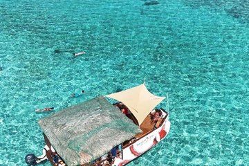 Roatan Tiki Boat Treasure Tours and Charters
