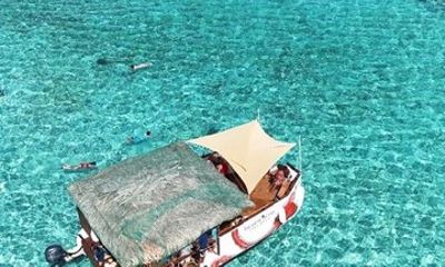 Roatan Tiki Boat Treasure Tours and Charters