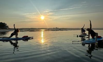 Sunset Paddleboard Yoga Class in Seabrook
