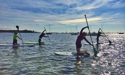 Rise and Shine Paddleboard Yoga Class in Hingham MA