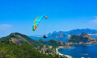 Try paraglider flight with video on the beautiful view of Rio.