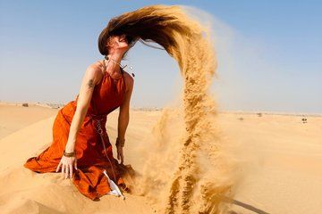 Abu Dhabi Desert Safari with Camel Ride BBQ Dinner and Live Shows