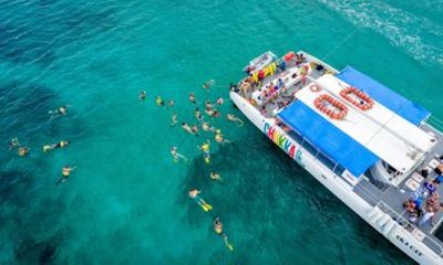 Dunns River Falls Climb Zipline and Catamaran Tour from Kingston