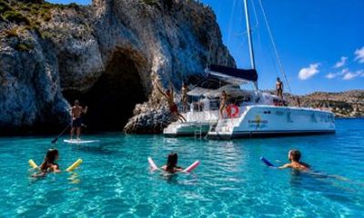 Kolympia 4 Hour Catamaran Cruise with Lunch and Unlimited Drinks