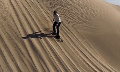 Adrenaline Fueled Quad Biking and Sandboarding in Essaouira