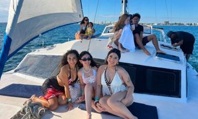 Catamaran to Isla Mujeres with Snorkeling and Open Bar
