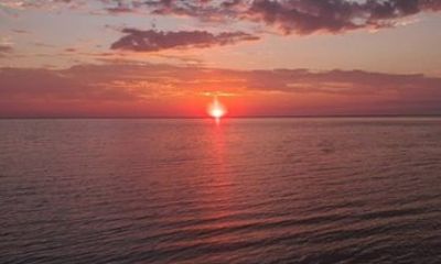 Sandwich Harbor Sunset with Dune Drive and Ocean Views