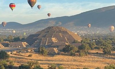 Balloon sunrise over Teotihuacan and Basilica pyramids
