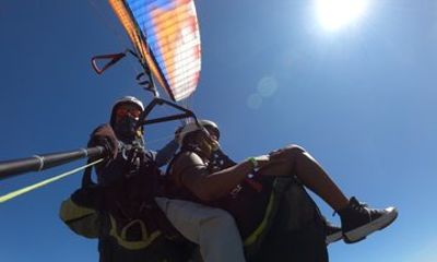 Brazilian medellin paragliding with luxury transportation