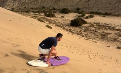 Ocean Dunes Sandboarding, Waterfall and Sea Cave Tea Experience