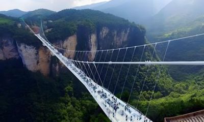 Glass Bridge and Huanglong Cave 1-Day Tour with Transfer Included