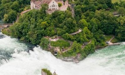 From Zurich Rhine Falls Tour with Boat Ride and Hotel Pickup