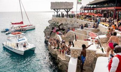 Negril 7 Mile Beach and Rick Cafe Beach Cliffs and Sunset