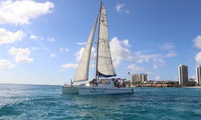 Tropical Time Private Catamaran Charter with Snorkeling and Lunch