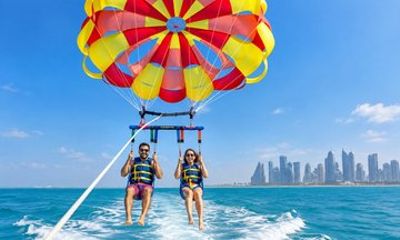 Doha Parasailing Adventure and Speedboat Ride with Transfers