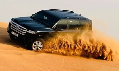 Abu Dhabi Desert Safari With Camel Riding BBQ and Live Shows