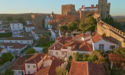 Private Lisbon to Porto Tour | Óbidos, Nazaré, Batalha & Coimbra