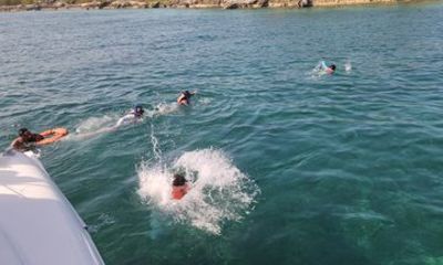 Isla Mujeres Catamaran Tour with Open Bar and Snorkel